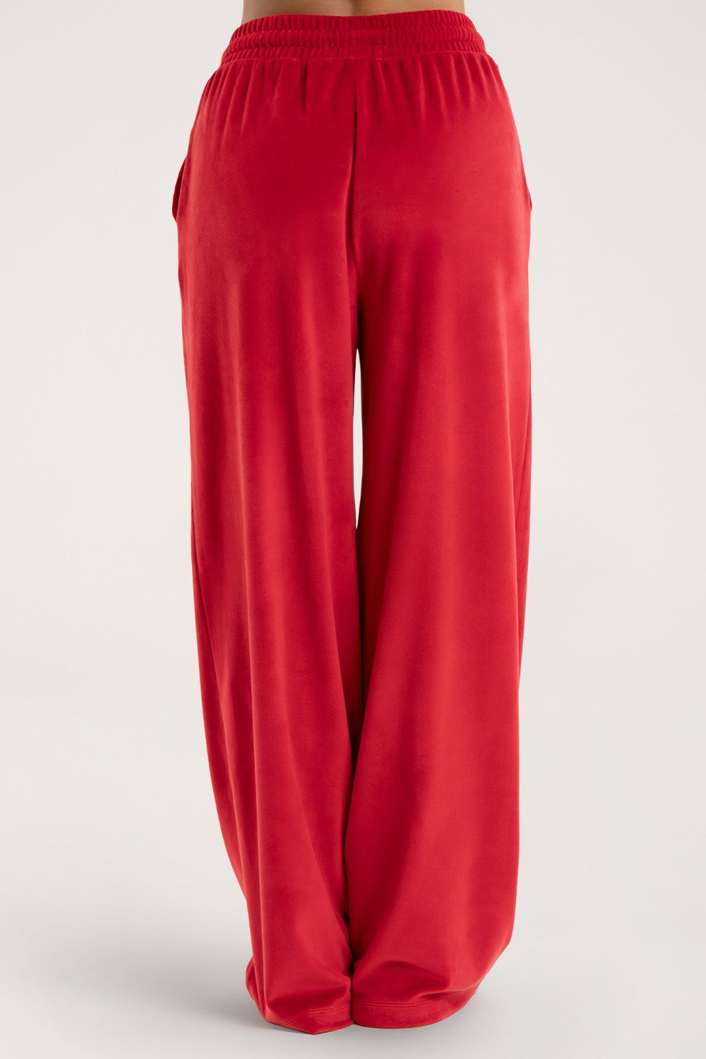 Hlače trenirke velour red